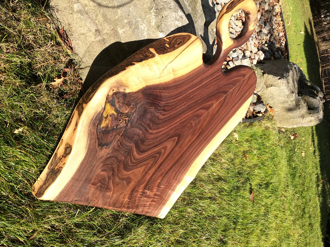 Two tone walnut board w gold epoxy