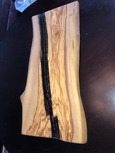 Color changing olive wood board