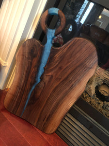 Split walnut serving board with blue epoxy